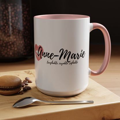 Anne-Marie 11 oz Coffee Cup on table with spoon